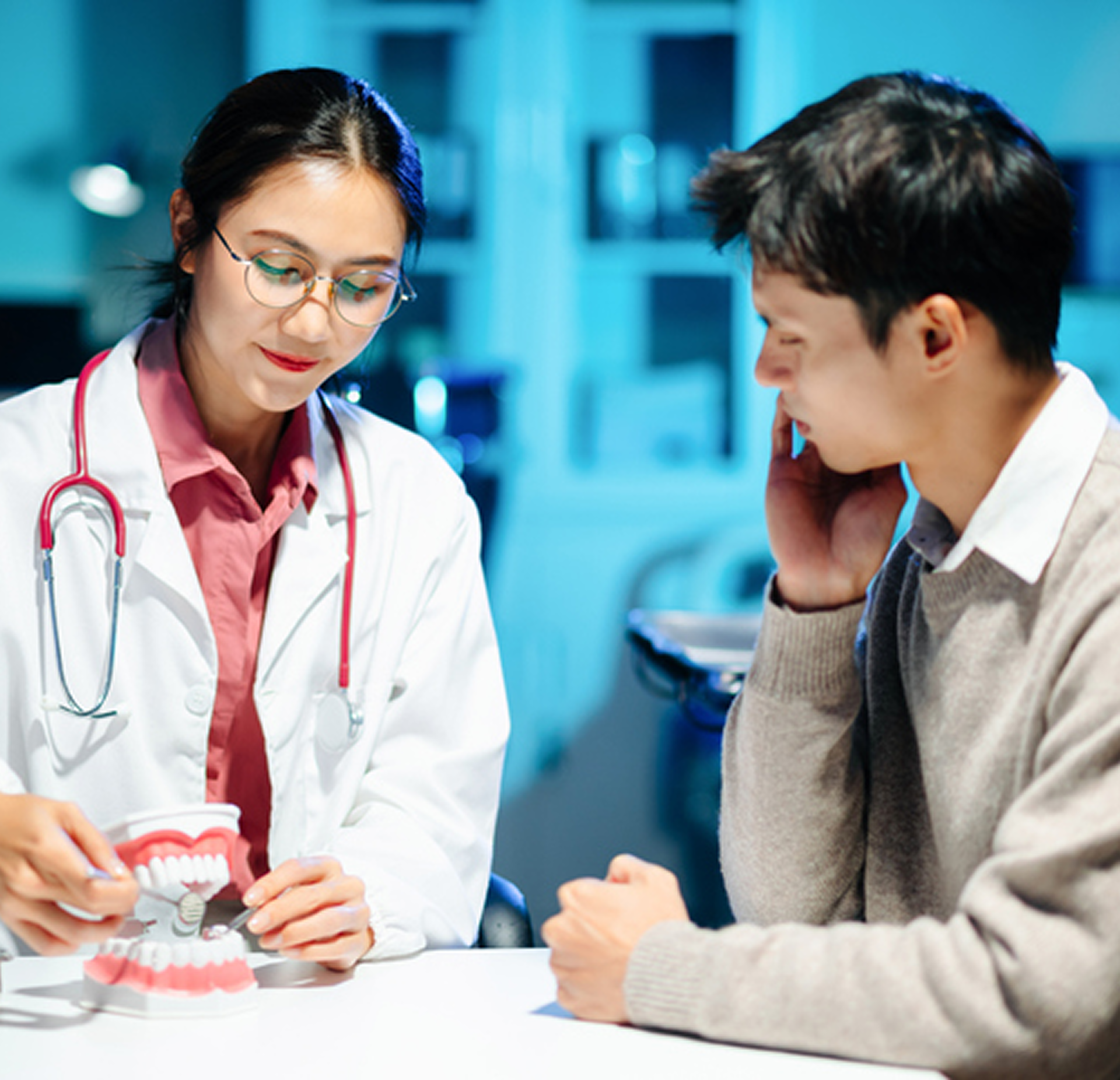 Doctor discussing oral health with patient
